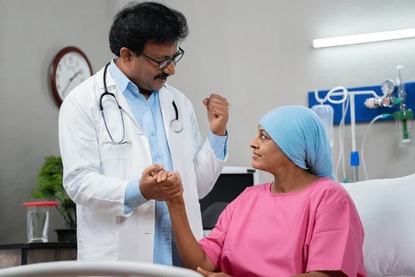 indian-senior-doctor-consoling-encouraging-600nw-2368718277
